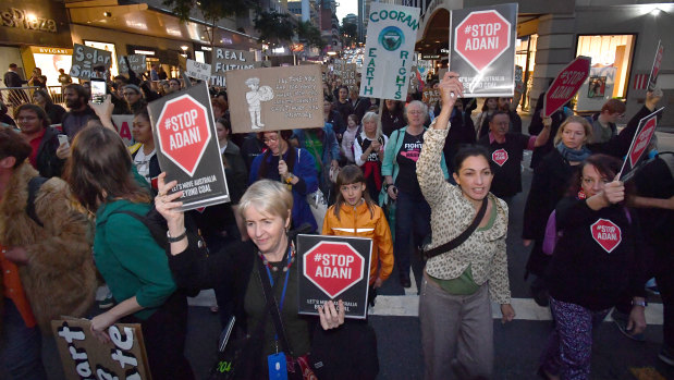 Anti-Adani protestors from Uni Students for Climate Justice marching through Brisbane streets on June 7.
