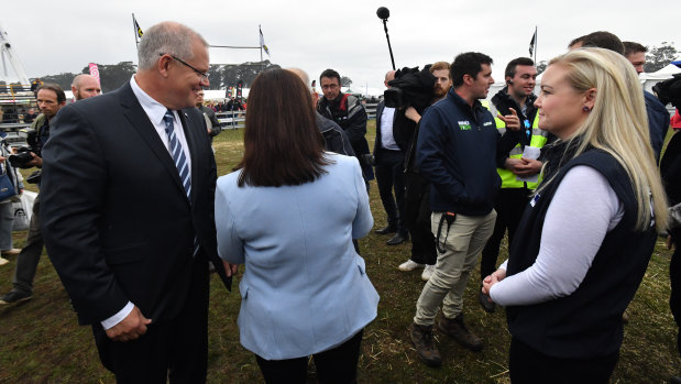 Prime Minister Scott Morrison and Liberal candidate Jessica Whelan campaigning near Launceston, Tasmania, on Thursday.