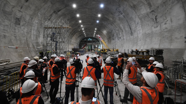 Ministers Andrew Constance and Rob Stokes address the media 50 metres below North Sydney.