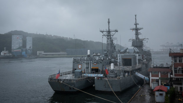 Two Taiwanese Navy warships are seen anchored in Keelung, Taiwan, on Friday.