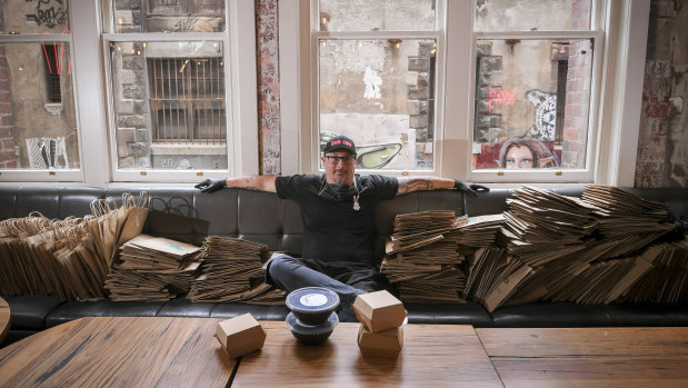 Benjamin Cooper, head chef at Chin Chin, co-ordinating deliveries from the empty restaurant. 