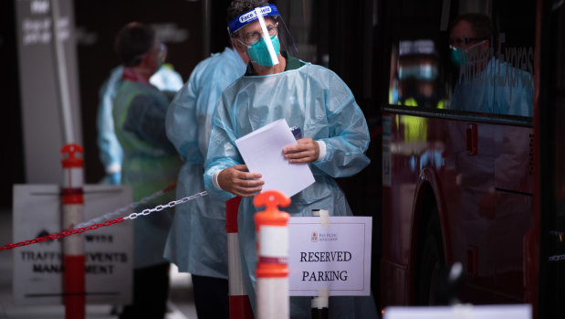 A hotel quarantine worker in Melbourne this month. 