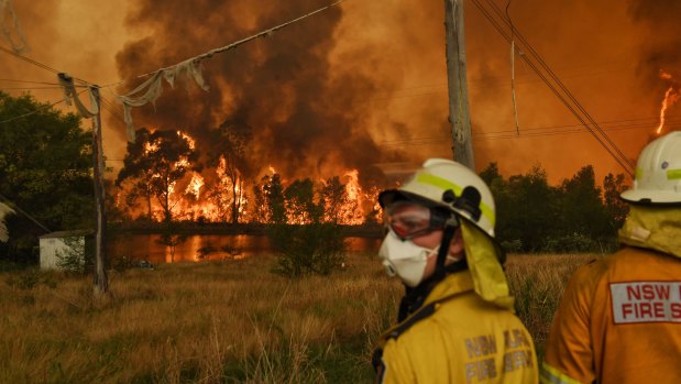 Members of the Rural Fire Service monitoring  the Gospers Mountain fire on the edge of Bilpin in the Blue Mountains last December. 