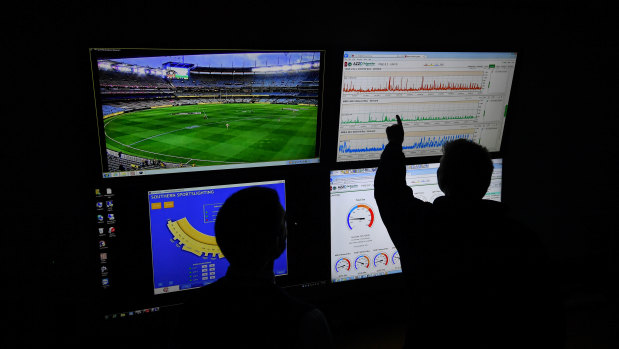 Staff in the MCG control room monitor energy use at the ground during the finals series.