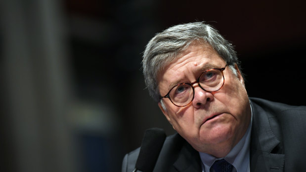 US Attorney-General William Barr appears before a House Oversight Committee on Capitol Hill in Washington.