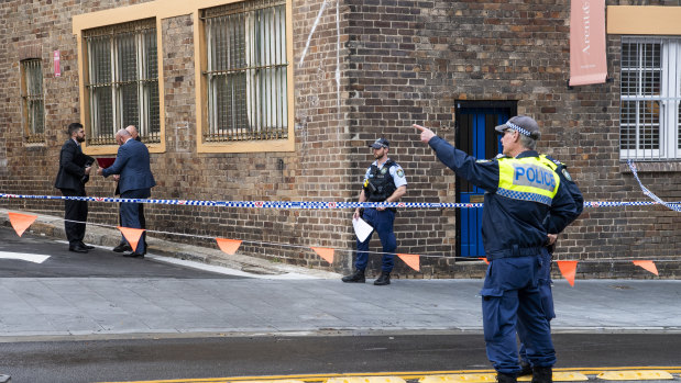 Police at the crime scene outside Essenza Italian restaurant in Surry Hills.