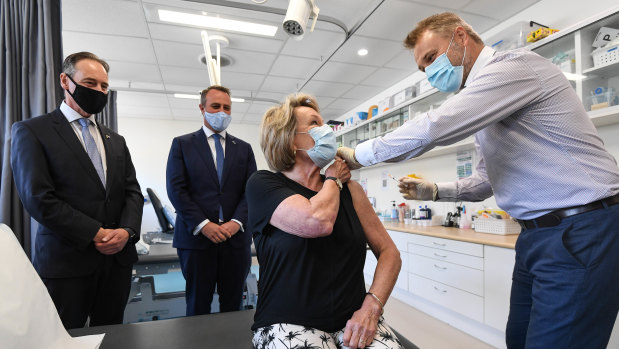 Health Minister Greg Hunt, Tim Wilson MP, Dale Austin (patient) and Dr Nick Kokotis.
Health Minister Greg Hunt in Sandringham visiting the Bluff Road Medical Centre. 29th March 2021 The Age News Picture by JOE ARMAO