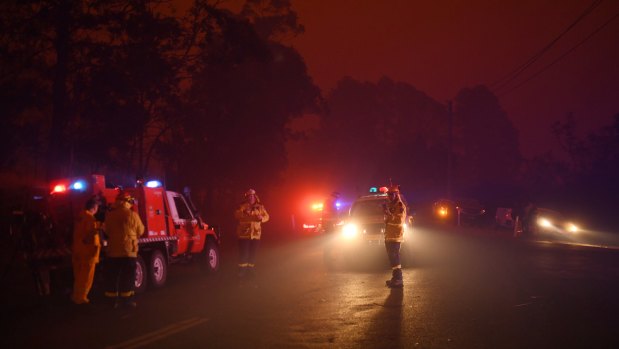 Dense smoke west of Nowra as the southerly moves through on Saturday evening.