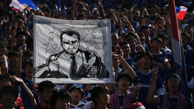 F. Marinos fans hold up a banner saluting Postecoglou as "brave and challenging".