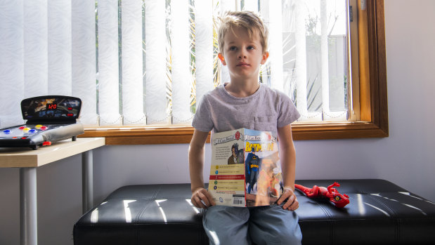 Mary Gabbey's son Henry likes the variety of topics he can explore on weekly visits to the library.