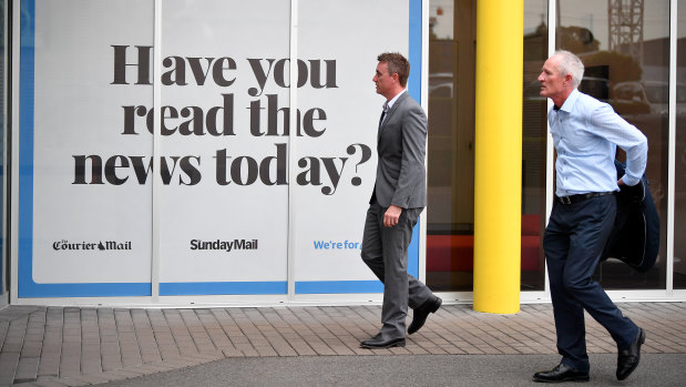 One Nation party officials James Ashby (left) and Steve Dickson walk from a press conference in Brisbane on Tuesday.