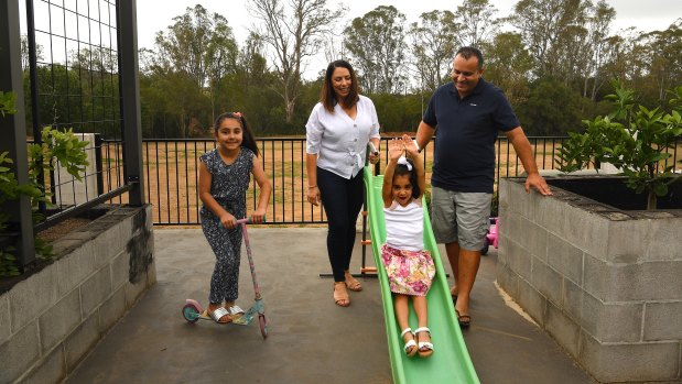 Charlize, pictured on the slide, has had two liver transplants due to a rare metabolic condition.