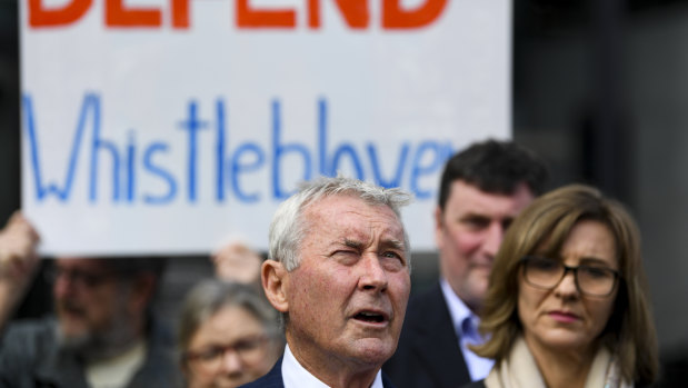 Lawyer Bernard Collaery addresses the media outside the Supreme Court in Canberra this month. 
