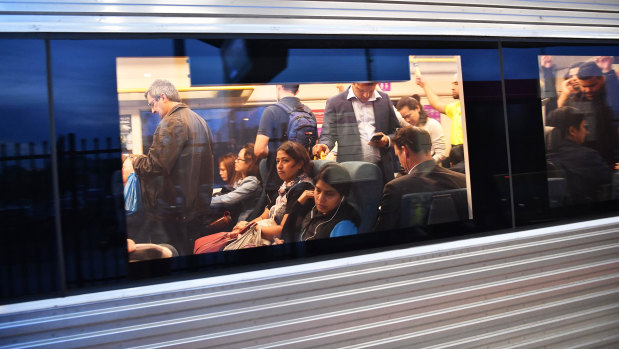 Passengers on an overcrowded V/Line train.