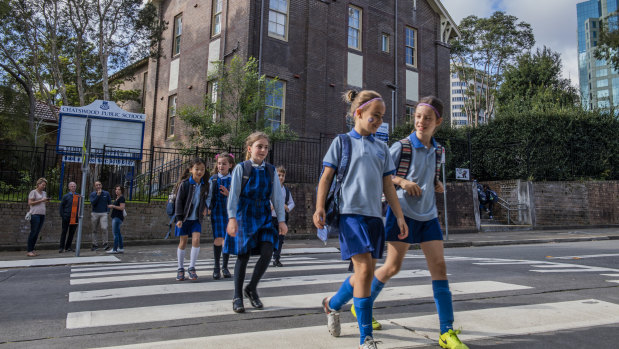 Parents and students outside Chatswood Public School. 