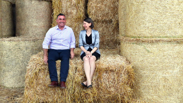 Premier Gladys Berejiklian and Deputy Premier John Barilaro on Boyd Baling farm in Lismore.