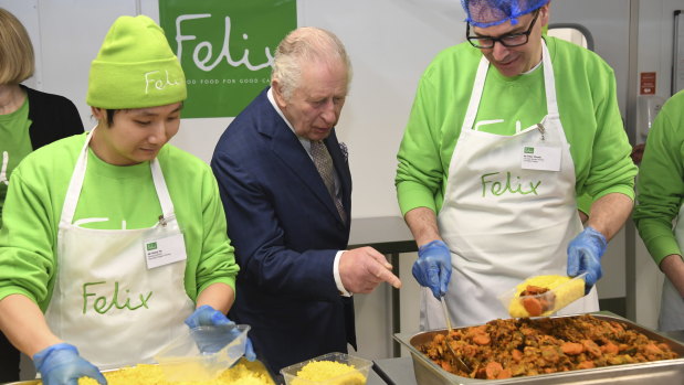 A recent photo of Charles pointing to a dish that is no doubt ten times better than Coronation Quiche.