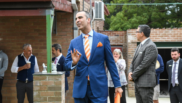 Michael Garofolo auctions off a house in Concord, Sydney, on Saturday.