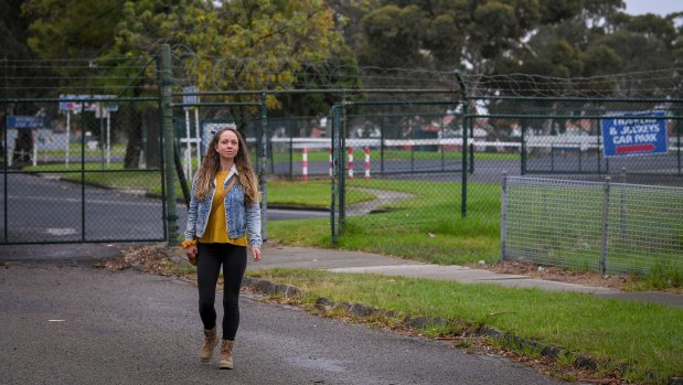 Springvale resident Zoe Mohl, outside Sandown Racecourse, says the number of houses planned on the site is “extreme”.