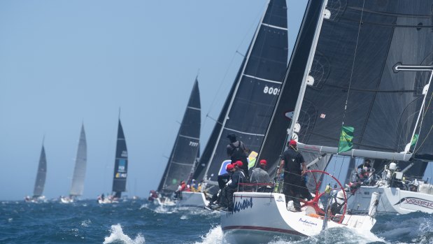 The yachts jostle for position before the start of the Sydney to Hobart.
