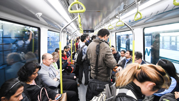 Passengers on a driverless train on the Metro Northwest line between Rouse Hill and Chatswood.