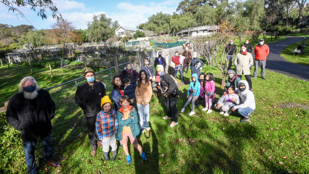 Locked out: Community gardeners outside the closed gardens on Friday.