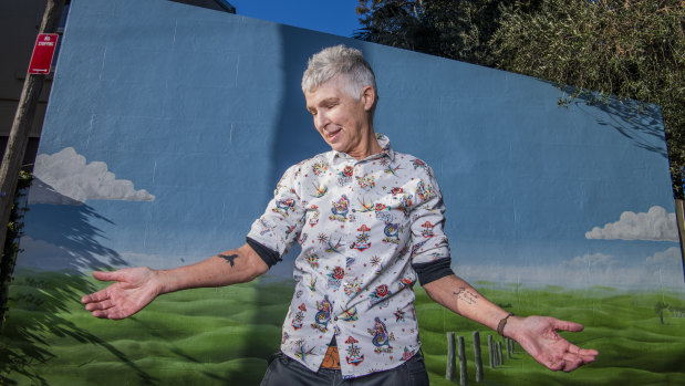 Andrea Phelan, 61, shows off her two tattoos. Getting a tattoo in your 60s and 70s is becoming more common, tattoo artists say.
