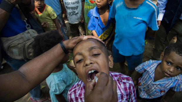 Polio vaccinations are conducted at the 8 Mile Settlement in Port Moresby.