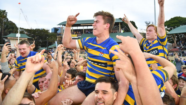 Uni's Guy Porter celebrates after Sydney University won the Shute Shield for the first time in five years. 