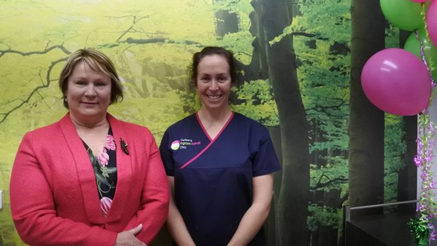 Liberal Member for Brindabella Nicole Lawder and Brindabella Podiatry owner Nicole Hart in the new Canberra Ingrown Toenail Clinic, which features a serene, green scene.
