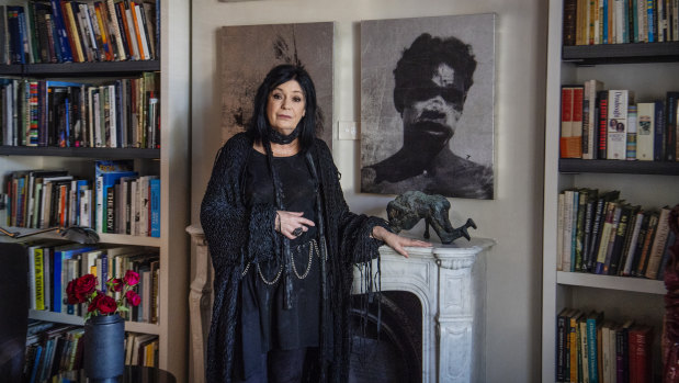Gallerist Gene Sherman at her Woollahra home with art by Brook Andrew and Olive Richmond. 