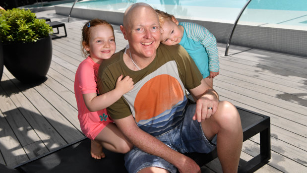 Jarrod Lyle with daughters Lusi (5) and Jemma (20 months).