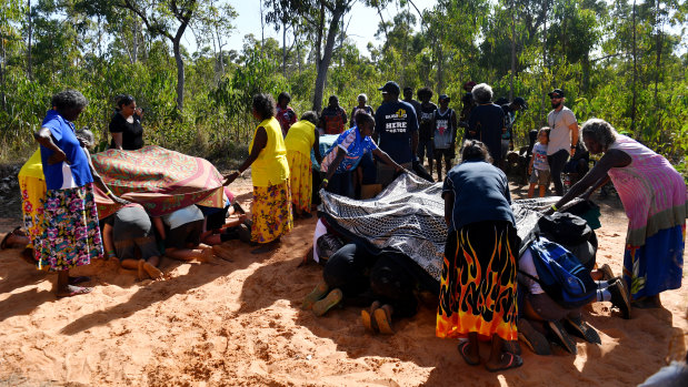 Gumatj women perform a smoking ceremony at the Youth Forum during the Garma Festival.
