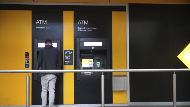 Two Russian nationals are accused of laundering money through ATMs across the country.