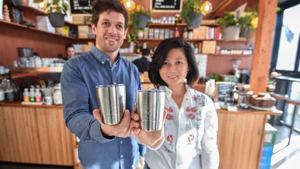 Benjamin Korff and Lily Yap at Kings and Knaves Espresso, a cafe participating in their Viva La Cup deposit scheme that lets you borrow reusable coffee cups.