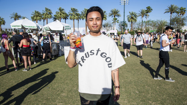 A festival goers wears Kanye West Sunday Service merchandise at Coachella on Sunday.