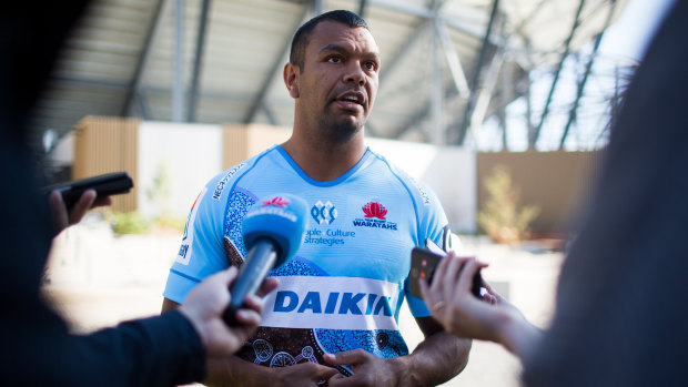 Tribute: Kurtley Beale models the Waratahs' first Indigenous jersey, which they wore in their loss to the Sunwolves.