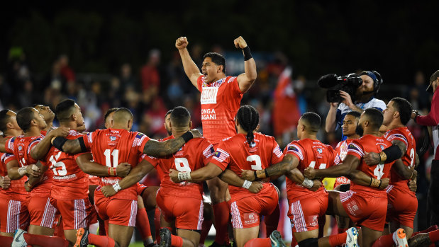 King of Tonga: Jason Taumalolo leads the Sipi Tau against New Zealand at last year's World Cup.