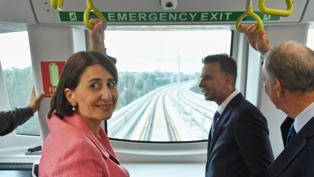 Premier Gladys Berejiklian and Transport Minister Andrew Constance take a ride on a metro train in Sydney's north west.
