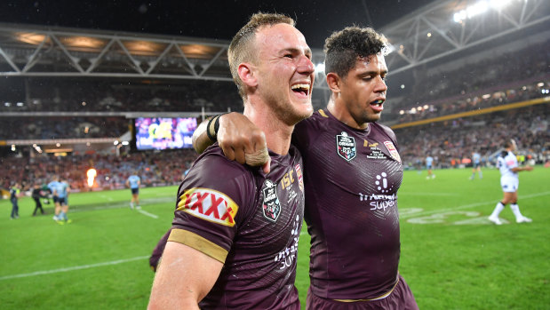 Brothers-in-arms: Daly Cherry-Evans celebrates with Dane Gagai.