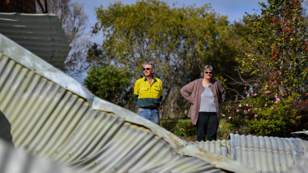 Lyn and Allan Wallwork are living in their shed while waiting for the removal of their destroyed Sarsfield home.