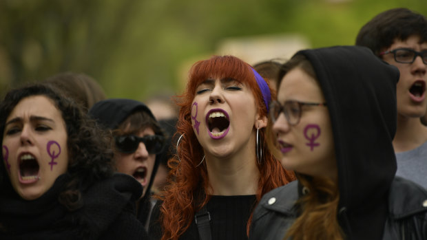 Women shout slogans during a protest against sexual abuse in Pamplona, northern Spain.