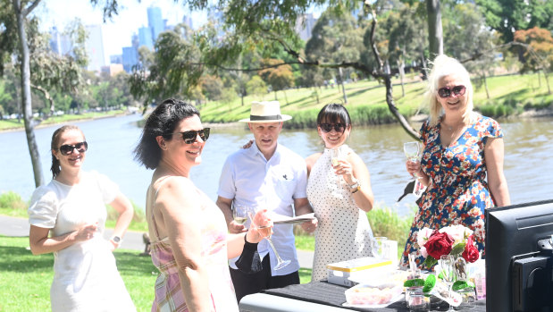 Serina Dowding, Melinda Sutherland,   Duncan Macdonald, Christina Ferguson and Helen Vay enjoying Cup day at Melbourne's Yarra Park Linear Reserve.