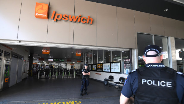 Police attend the scene of a fatal shooting at the Ipswich Central railway station in Ipswich.