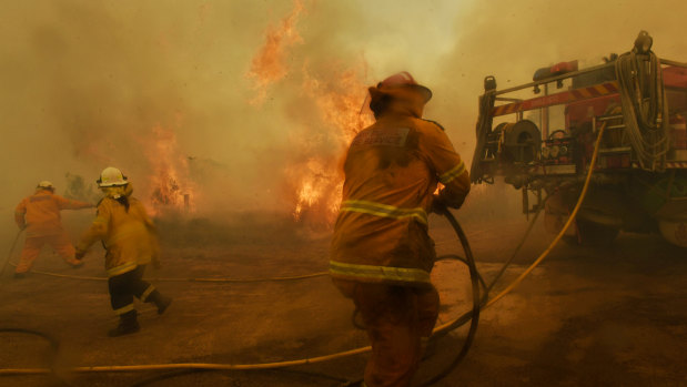 Spot fires threaten to overwhelm RFS volunteer firefighters at Hillville.