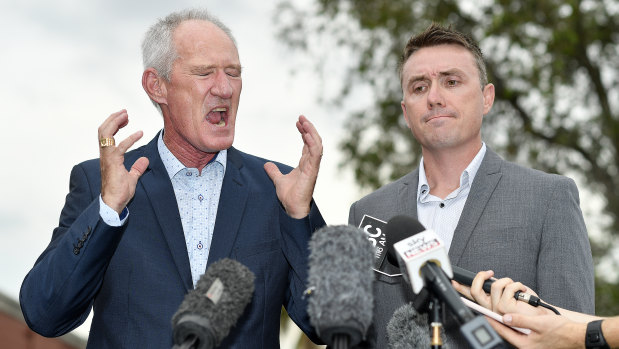 One Nation officials Steve Dickson and James Ashby answer questions at a press conference in Brisbane.