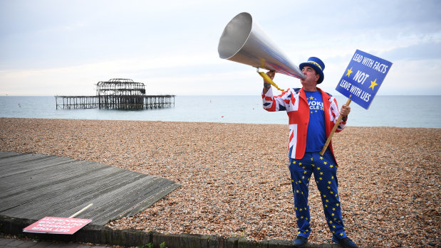 Anti-Brexit protester Steve Bray on a beach at Brighton, where the Labour conference is debating the party's stance on Brexit.