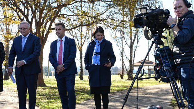Prime Minister Scott Morrison, Transport Minister Andrew Constance and NSW Premier Gladys Berejiklian in Sydney on Monday