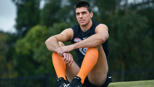 Carlton ruckman Matthew Kreuzer, in the orange socks the Blues will wear for the Carlton Respects match, raising awareness for equality and prevention of family violence.