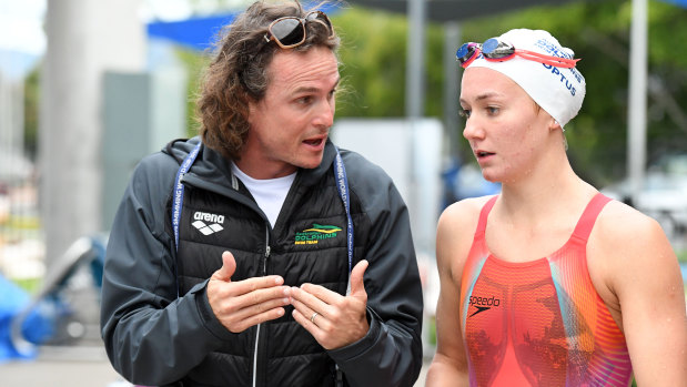 Ariarne Titmus with coach Dean Boxall during a Dolphins team training camp in Cairns last year.